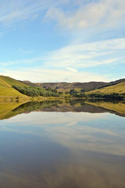 lake surrounded by beautiful hilly area